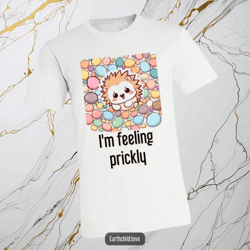 Funny Kawaii hedgehog character in a playful rolling motion amongst vibrant, colorful pebbles, a fun t-shirt.